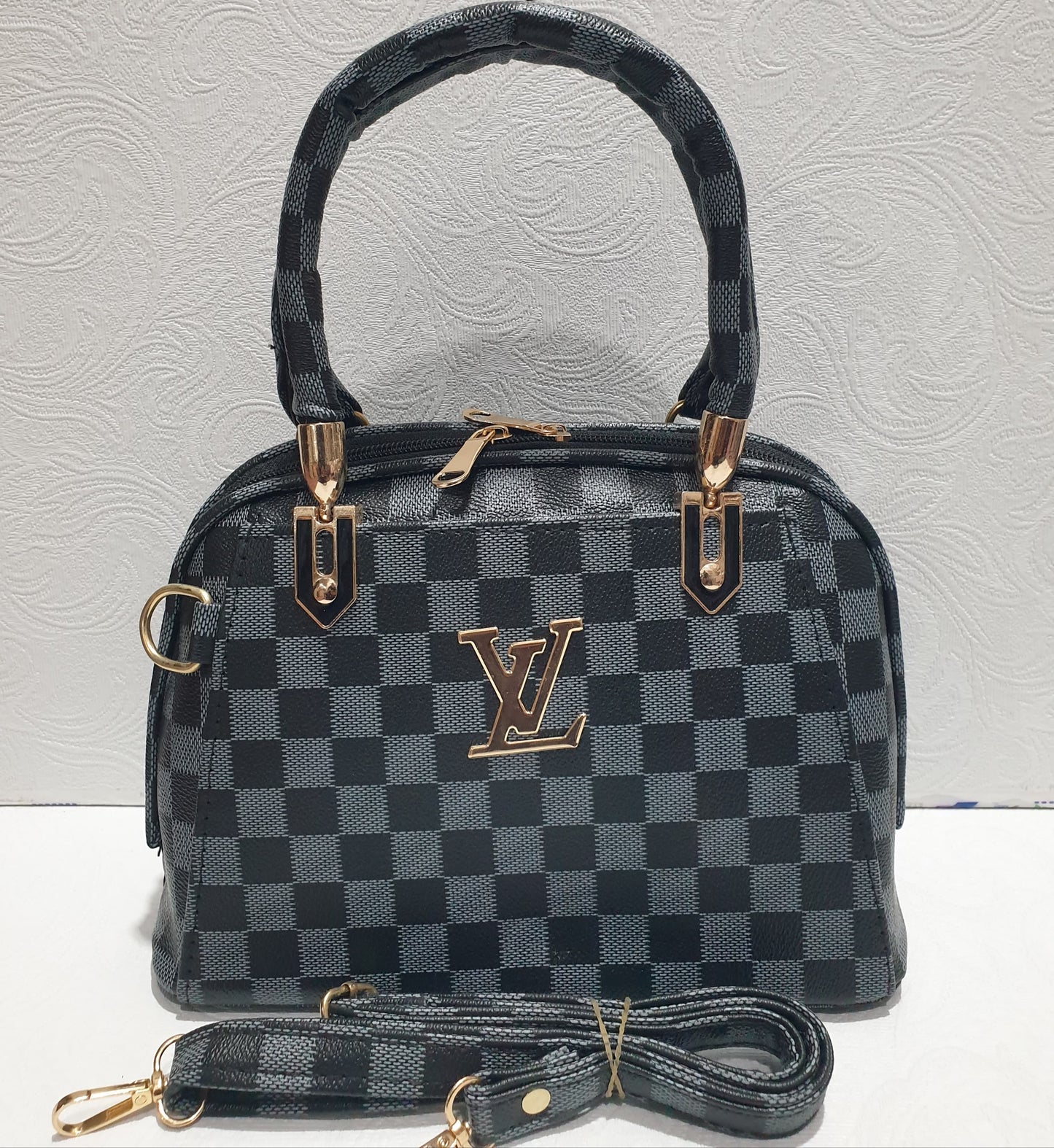 Elegant Checkered Handbag with Gold Accents