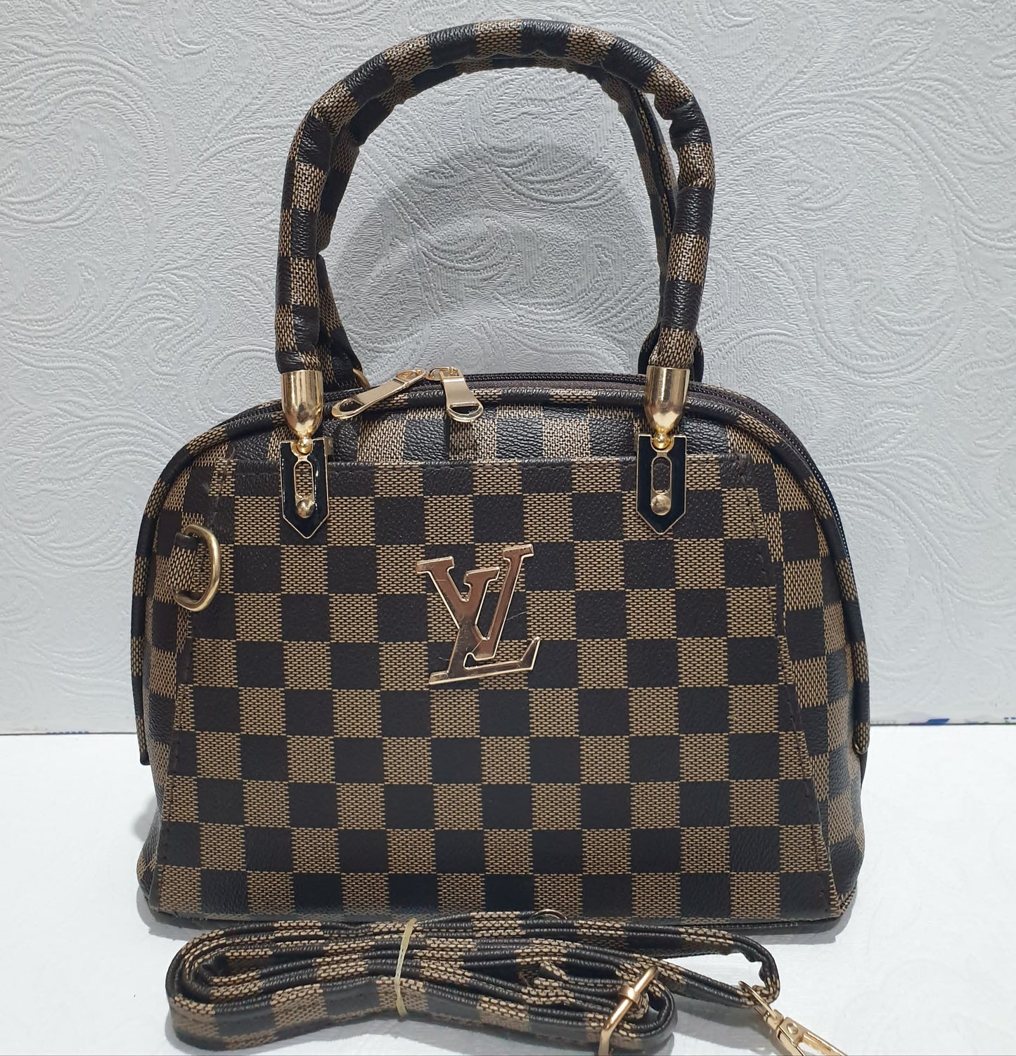 Elegant Checkered Handbag with Gold Accents