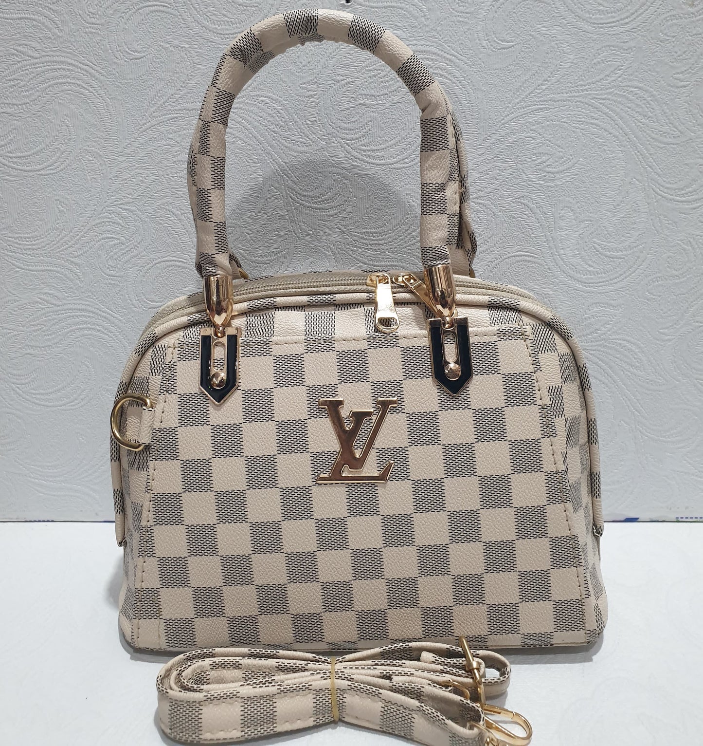 Elegant Checkered Handbag with Gold Accents